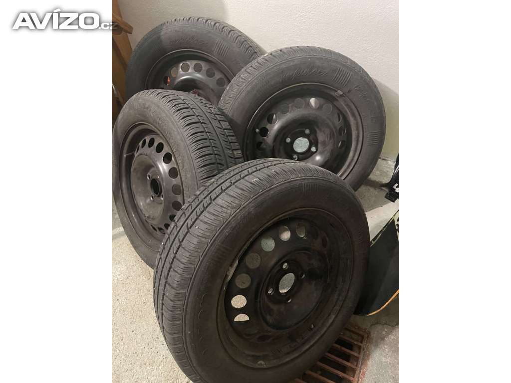 Opel astra - 4 plechove disky s pneumatikami