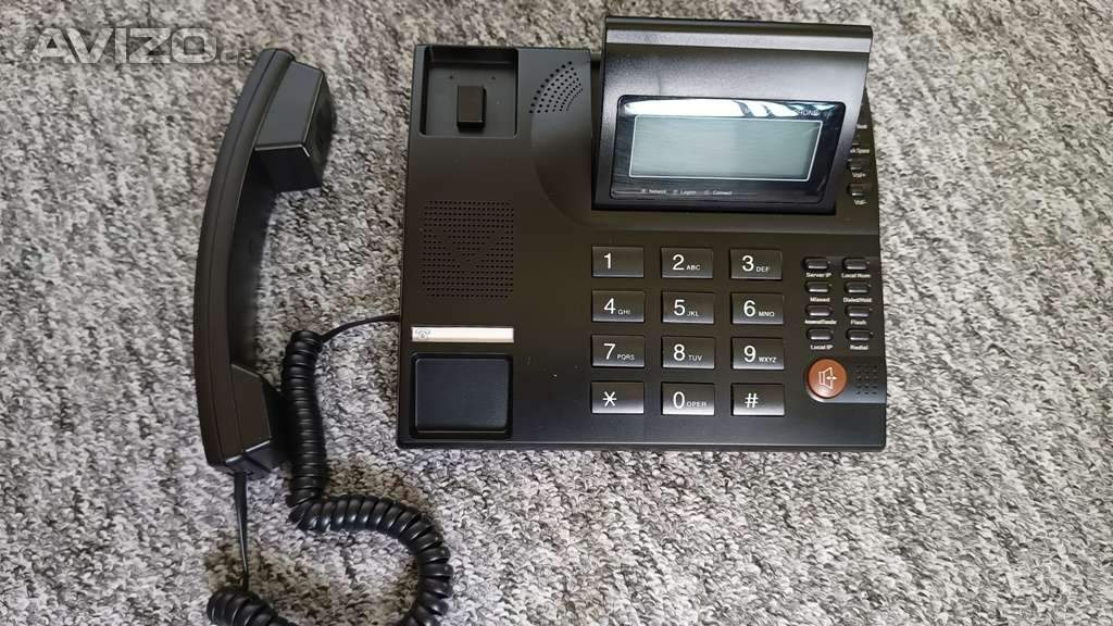 Telefonní přístroj BROADBAND IP NETWORK PHONE pro komunikaci na internetu.