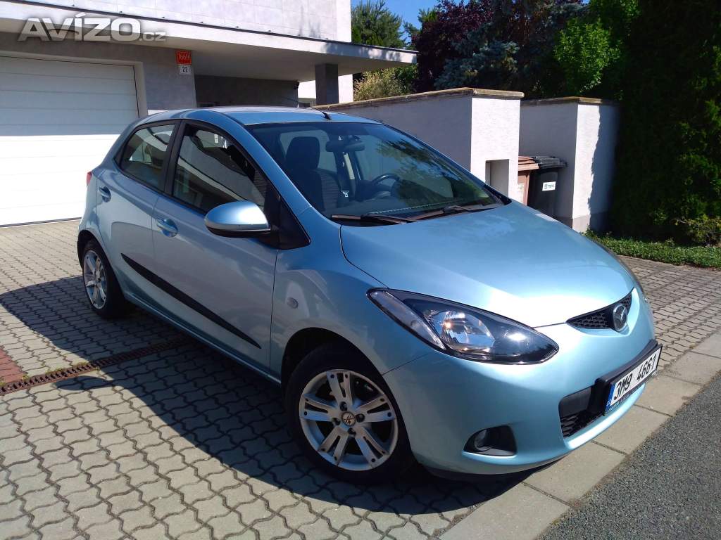 Prodám Mazda 2 1.3 63Kw benzín, r. 2009, nová v ČR.