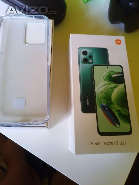 Nový mobilní telefon v záruce 
