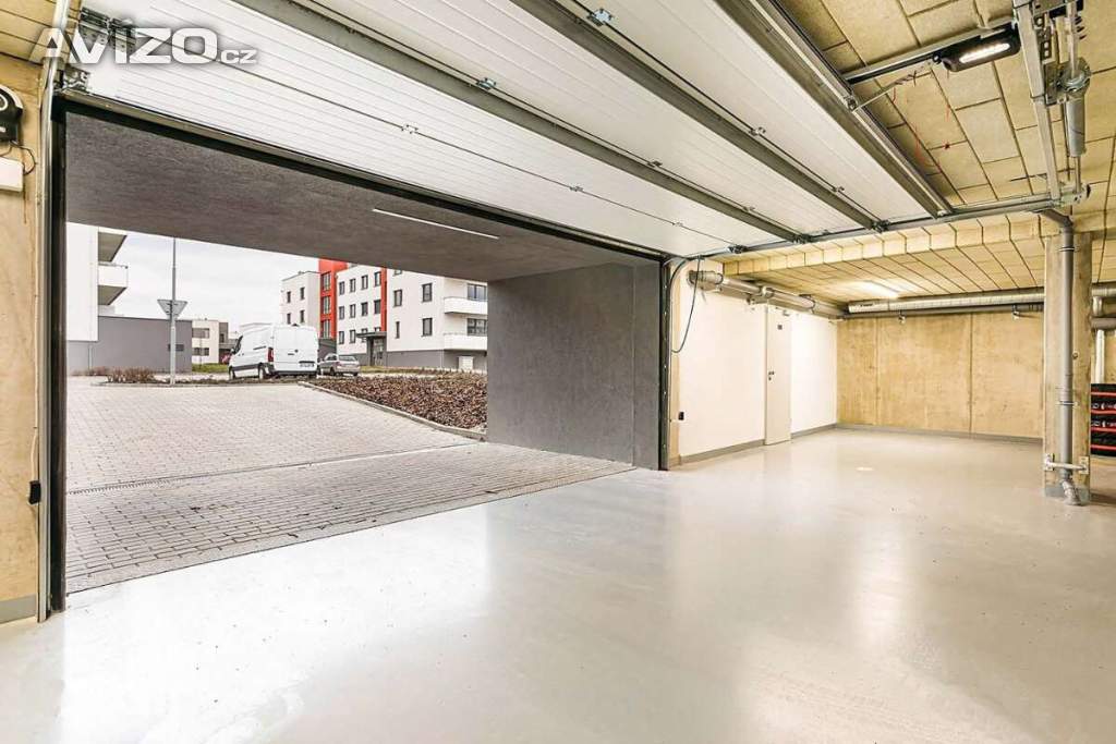 Prodám kryté garážové stání  v OV, Zelnice II., Slavkov u Brna