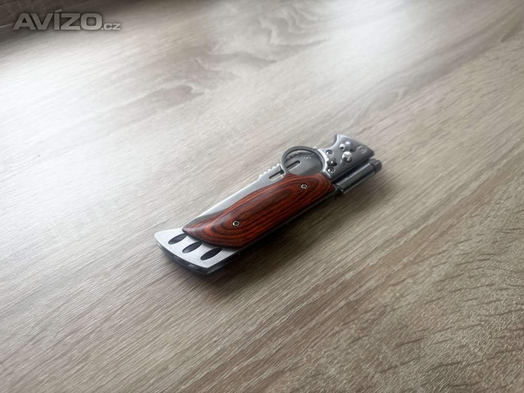 Foto inzerátu Kapesní zavírací (vystřelovací) nůž Dinosaur se svítilnou