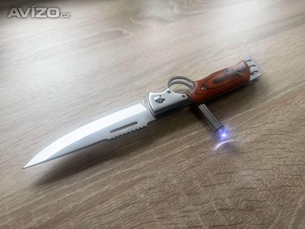 Foto inzerátu Kapesní zavírací (vystřelovací) nůž Dinosaur se svítilnou
