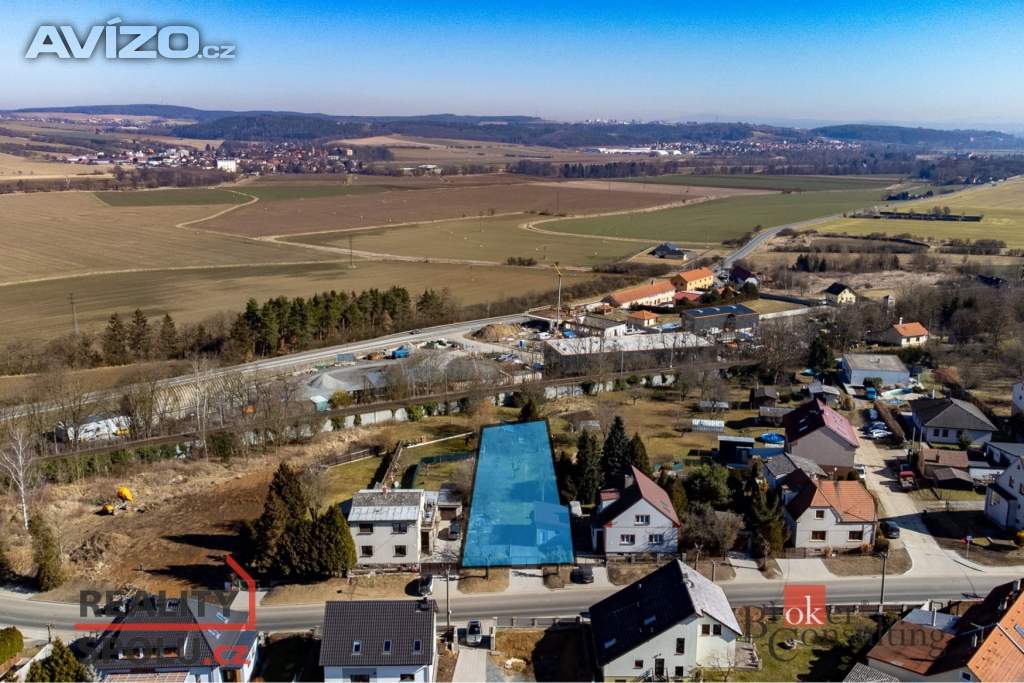 Prodej stavebního pozemku 1 097 m2, Vochov