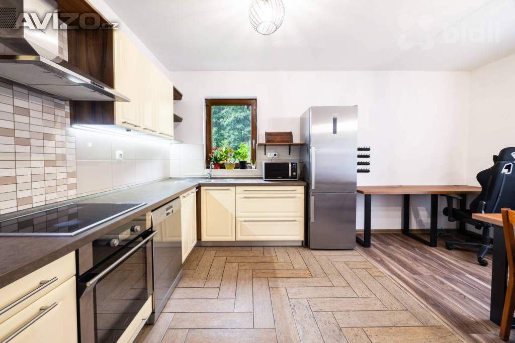 Foto inzerátu Prodej slunného bytu 3+1 75 m2, se zahradou 165 m2 v obci Janská