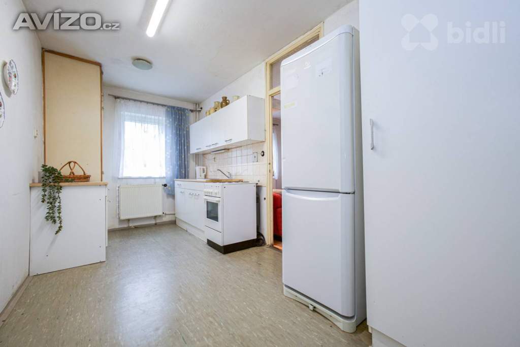 Foto inzerátu Exkluzivně nabízíme prodej řadového rodinného domu s garáží v Praze 9 -Vinoř.