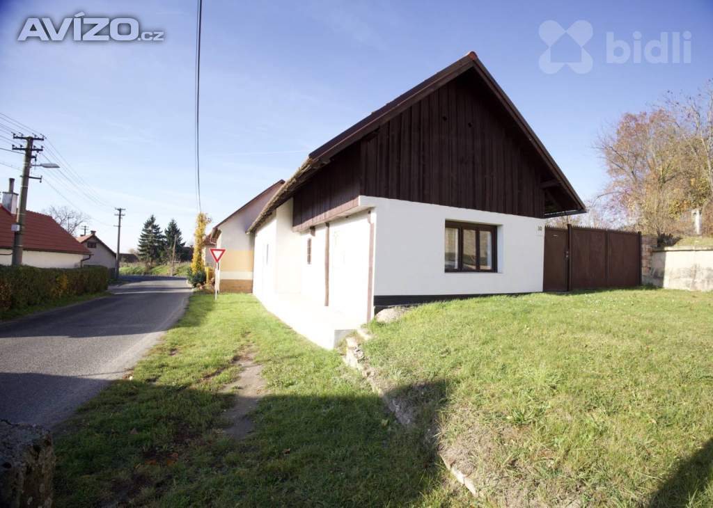 Rodinný dům se zahradou - ideální pro trvalé bydlení i rekreaci.