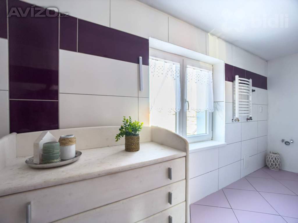 Foto inzerátu Prodej rodinného domu s pneuservisem a kadeřnictvím