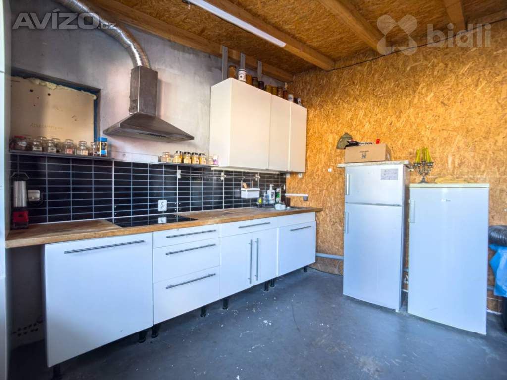 Foto inzerátu Prodej rodinného domu s pneuservisem a kadeřnictvím