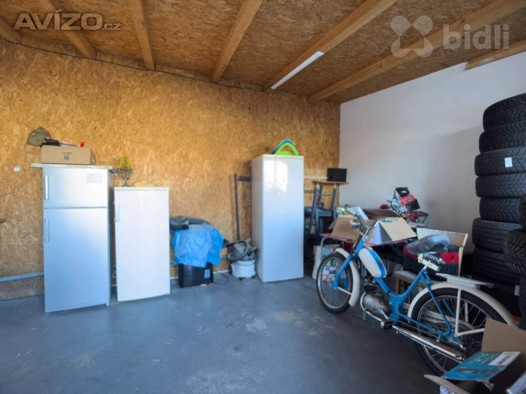 Foto inzerátu Prodej rodinného domu s pneuservisem a kadeřnictvím