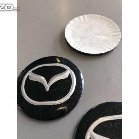 Foto inzerátu Středové pokličky / samolepky alu kola MAZDA černé
