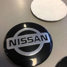 Fotka k inzerátu Středové pokličky / samolepky alu kol NISSAN černý / 15842970