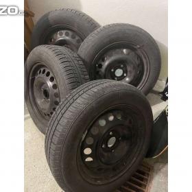 Fotka k inzerátu Opel astra -  4 plechove disky s pneumatikami / 18687199
