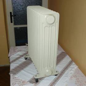 Foto inzerátu Přenosný olejový radiátor 2000 W SUPRA Holandsko