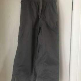 Fotka k inzerátu Prodám šusťákové kalhoty zn. Pocopiano vel. 140, šedé / 18822241