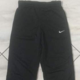 Fotka k inzerátu Dětské tepláky Nike. / 19641270