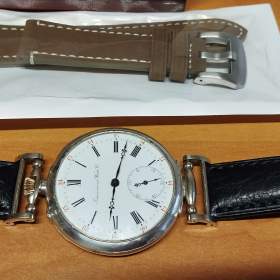 Foto inzerátu Starožitné stříbrné hodinky IWC Schaffhausen s krabičkou, páskem navíc, záruční list.