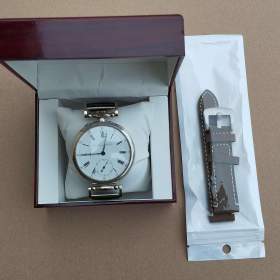 Foto inzerátu Starožitné stříbrné hodinky IWC Schaffhausen s krabičkou, páskem navíc, záruční list.