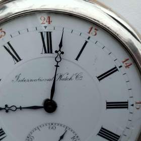 Foto inzerátu Starožitné stříbrné hodinky IWC Schaffhausen s krabičkou, páskem navíc, záruční list.