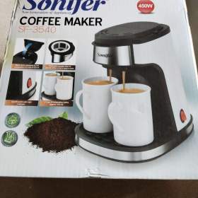 Foto inzerátu Kávovar s hrníčky 