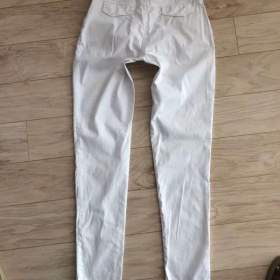 Foto inzerátu Bílé dámské, plátěné kalhoty * v. 36/S