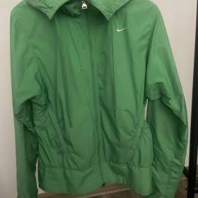 Zelená větrová bunda NIKE  / 19441723