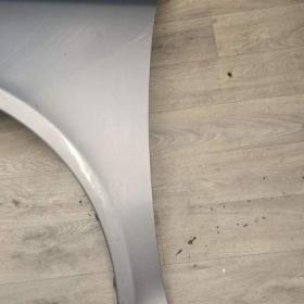 Foto inzerátu Originalni levý přední blatnik na Škoda Octavia 2