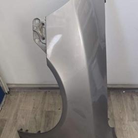 Foto inzerátu Originalni levý přední blatnik na Škoda Octavia 2