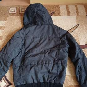 Foto inzerátu Dámská zimní bunda s kapucí