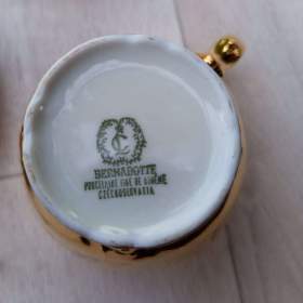 Foto inzerátu Starožitná pozlacená porcelánová sada Tři grácie