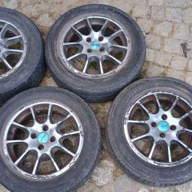 Alu kola Dezent 4x100 s pneu 195/60 R15 (#179) / 19556543