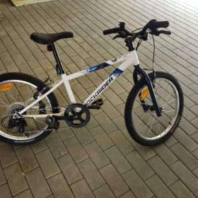 Prodám Dětské horské kolo 20 ST120 6–9 let bílo- modré -  ROCKRIDER / 19570151