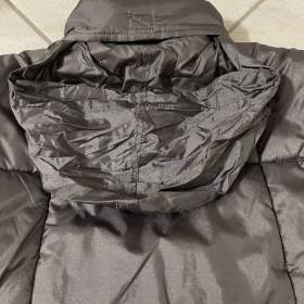 Foto inzerátu Dětská šedostříbrná bunda.