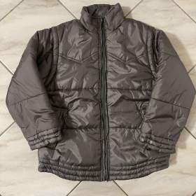 Fotka k inzerátu Dětská šedostříbrná bunda. / 18046620