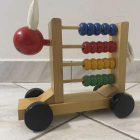 Foto inzerátu Dětské dřevěné počítadlo na kolečkách.