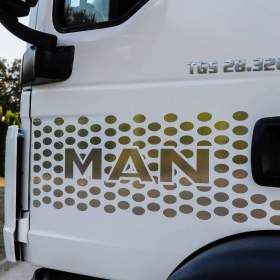 Foto inzerátu MAN TGS 28.320 HÁKOVÝ NOSIČ KONTEJNERŮ + HYDRAULICKÁ RUKA