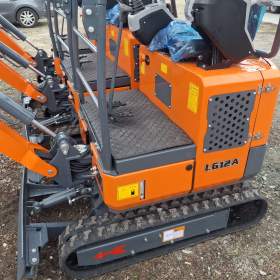 Foto inzerátu Minirypadlo Kubota LGCM LG12A s drapákem + 3 lžíce