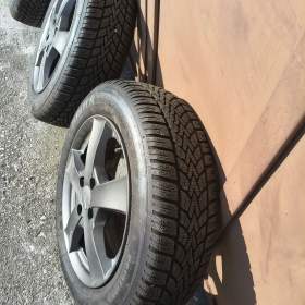 Foto inzerátu Alu kola,pneu Dunlop zimni,185/60 R15  