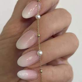 Foto inzerátu Elegantný zlatý náramok zo 14k zlata - Korai