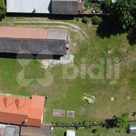 Prodej pozemku 1 023m²  se stodolou v malebné obci u Nymburka / 19053242