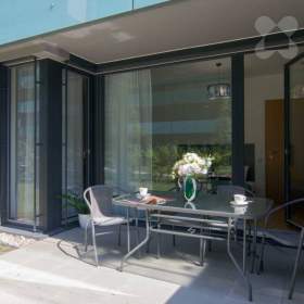 Foto inzerátu Rezervace! Pronájem moderního bytu 2+kk se zahrádkou - Praha 7, Holešovice