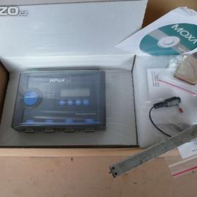 Foto inzerátu Serial server typ NPORT 5410 včetně adaptéru a příslušenství, fy MOXA